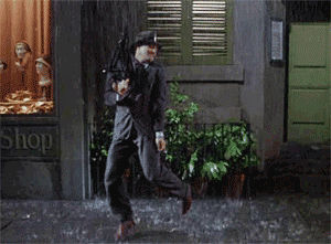 A man dancing in the rain