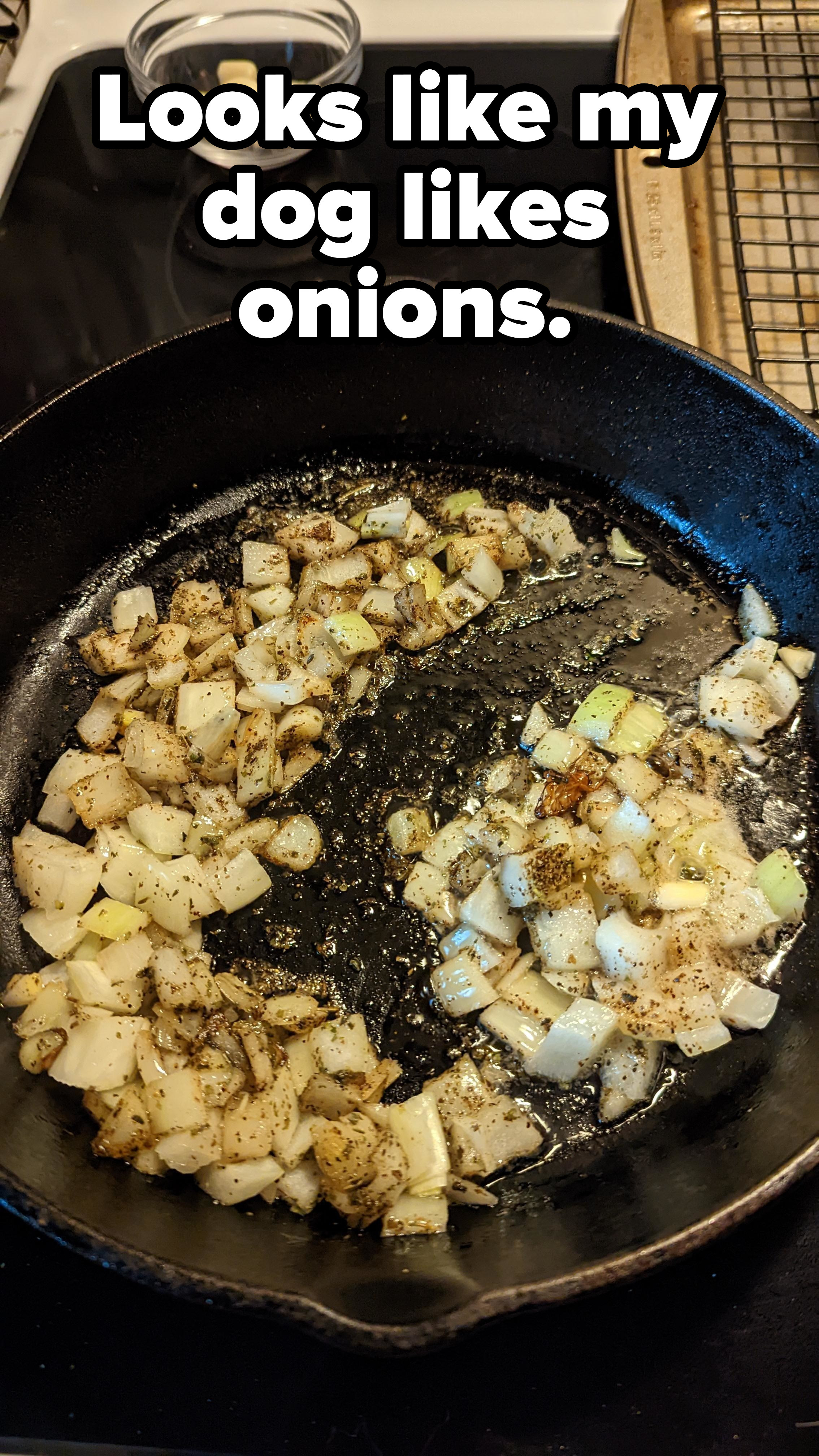 A pan with a big gap in the grilled onions