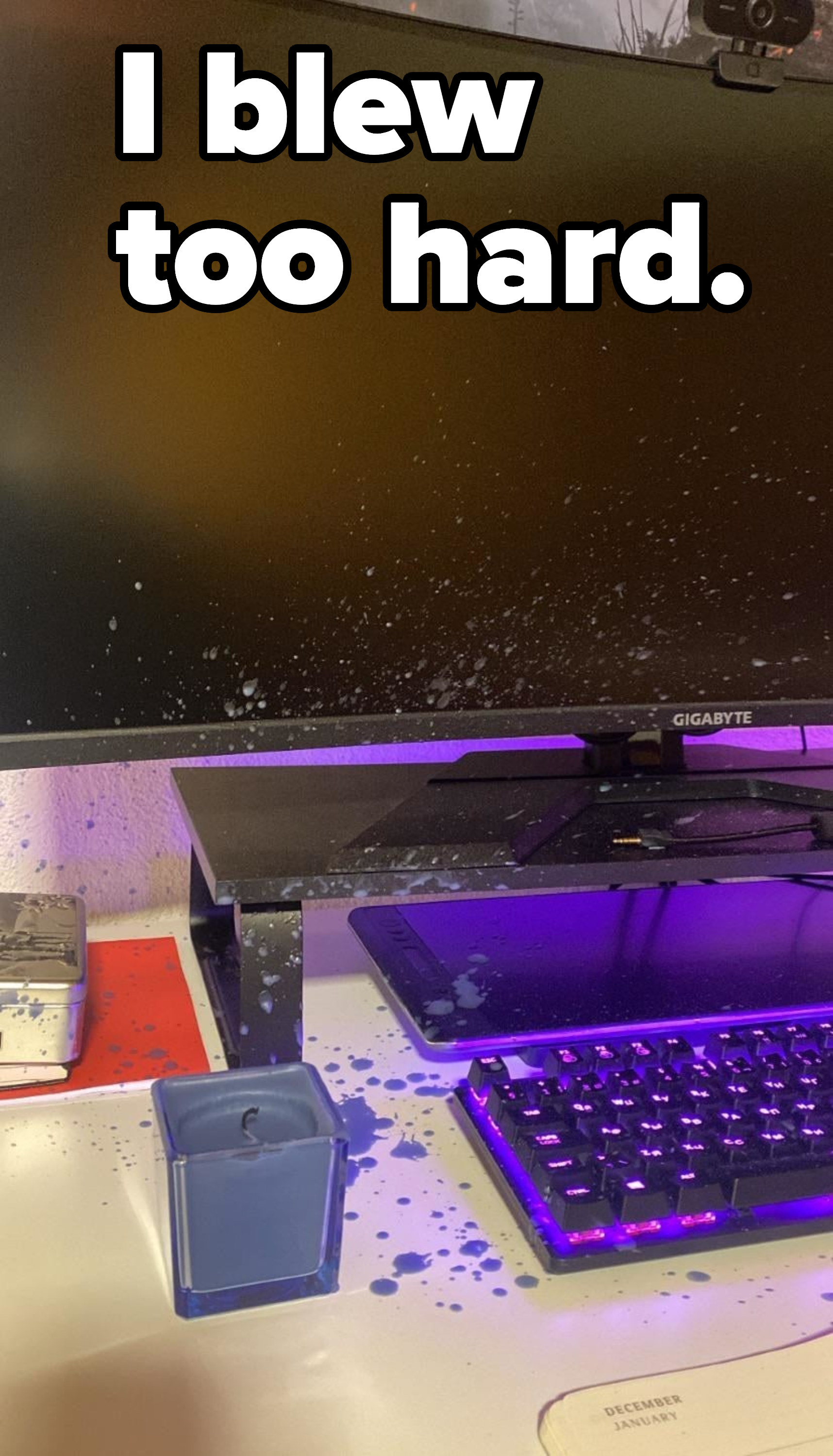 Candle wax all over a keyboard and monitor