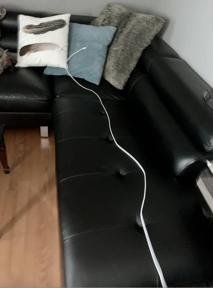 the extra-long cable strewn across May&#x27;s couch