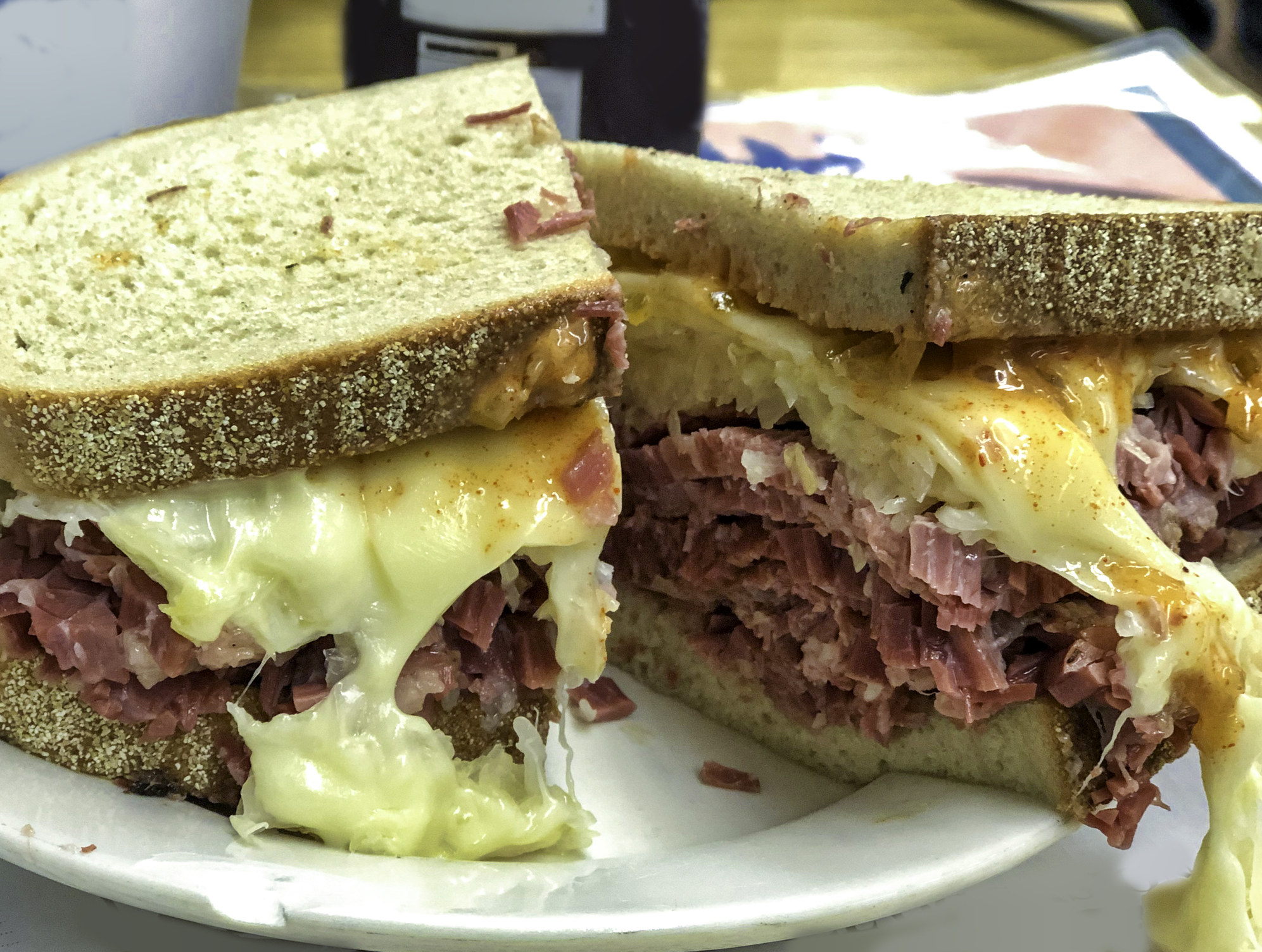 Pastrami sandwich with cheese.