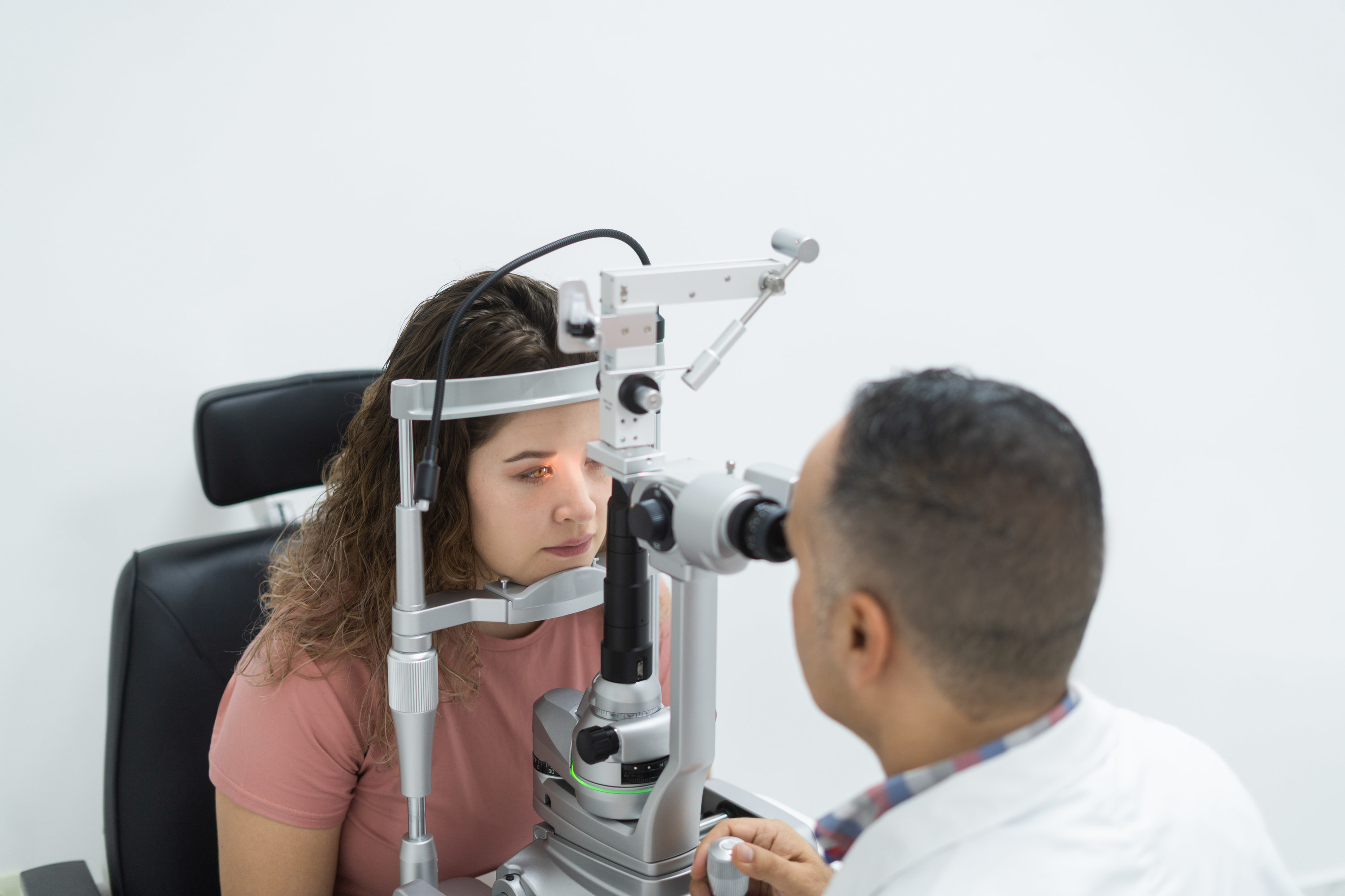 a young girl getting an eye exam