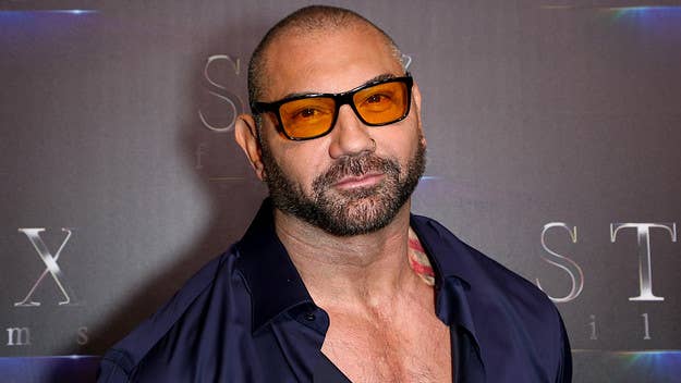 Dave Bautista told 'GQ' that he covered up a tattoo of Manny Pacquiao's team logo after the boxing champ made derogatory comments about gay people.