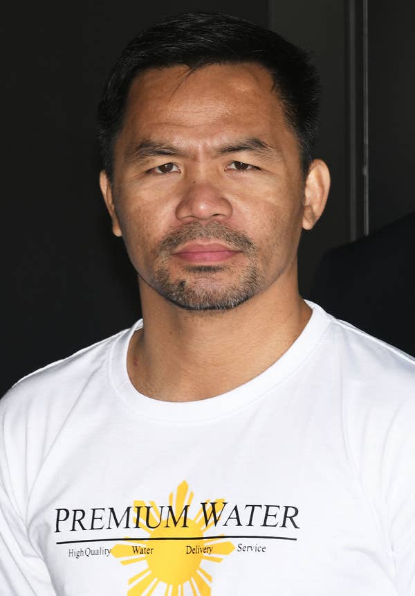 A close-up of Manny wearing a t-shirt that says &quot;Premium Water&quot;