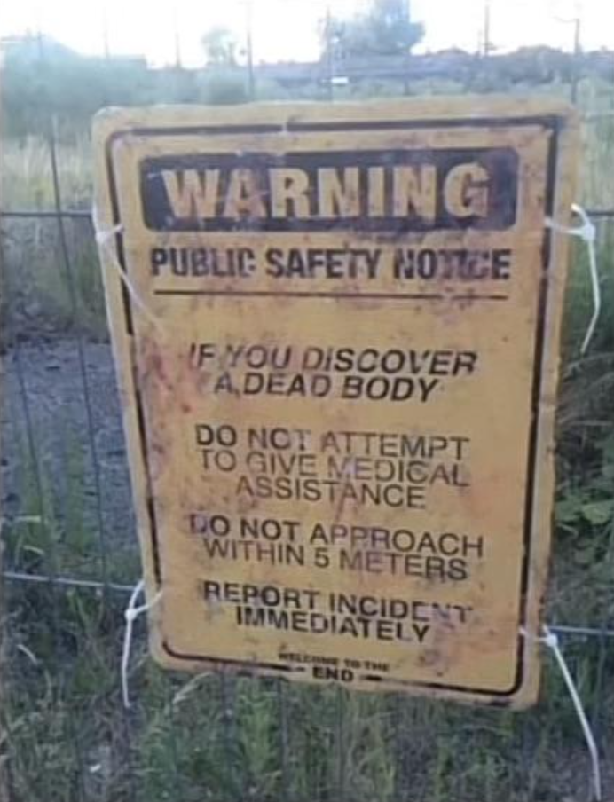 Warning: Public safety notice: If you discover a dead body, do not attempt to give medical assistance, do not approach within 5 meters, report incident immediately