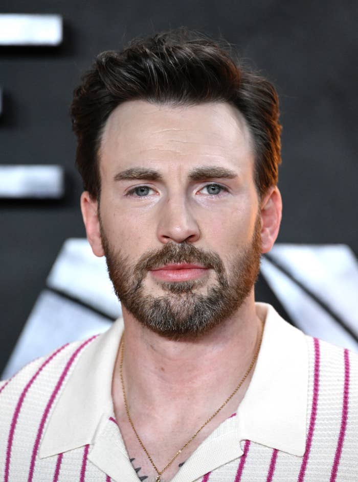 A close-up of Chris at a red carpet event
