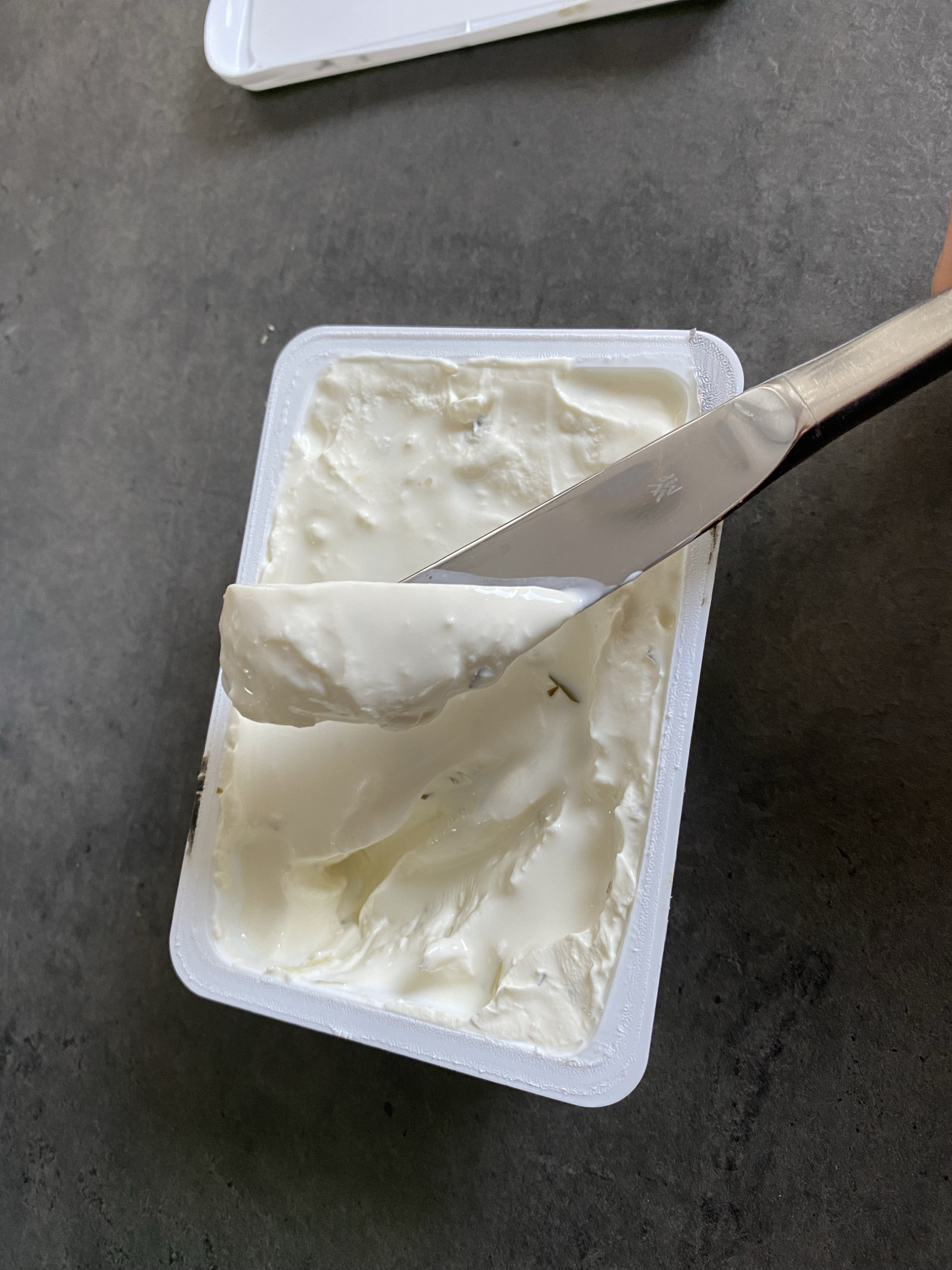 Cream cheese in a container