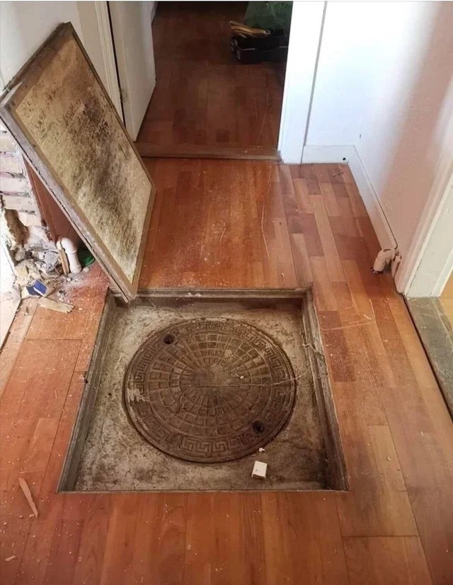 a manhole inside a hallway in someone&#x27;s house