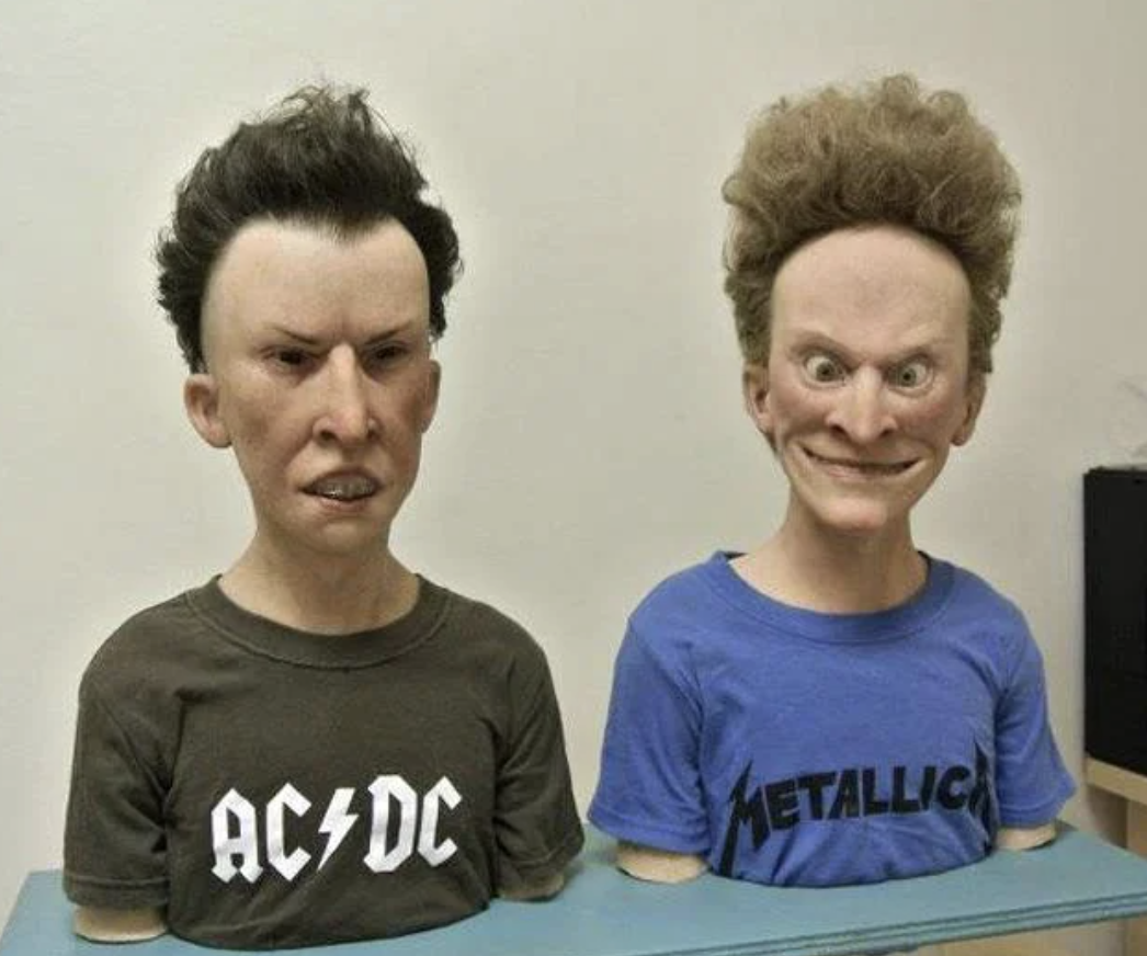 Beavis and Butt-Head busts with AC/DC and Metallica T-shirts
