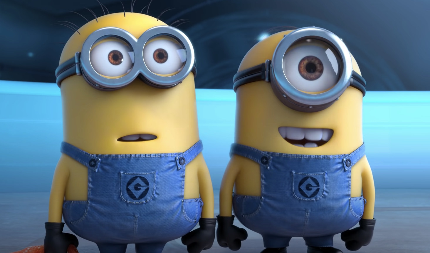 Two Minions standing next to each other