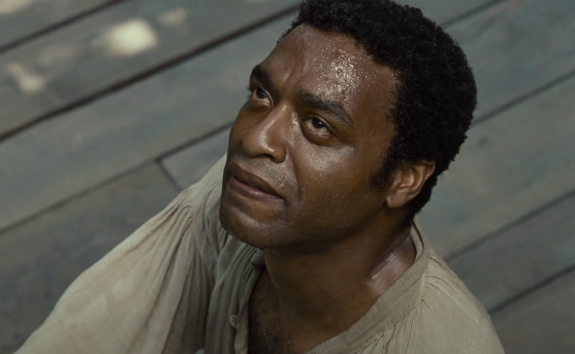 Chiwetel Ejiofor looking up at someone