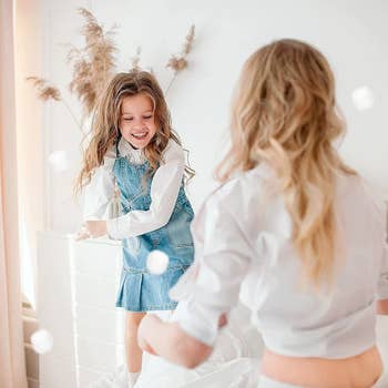 Child models having an indoor snowball fight