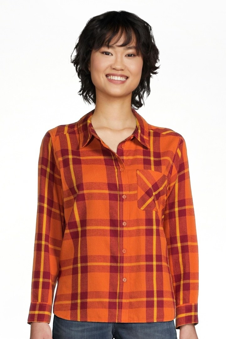 Model wearing the orange desert/rose wine shirt