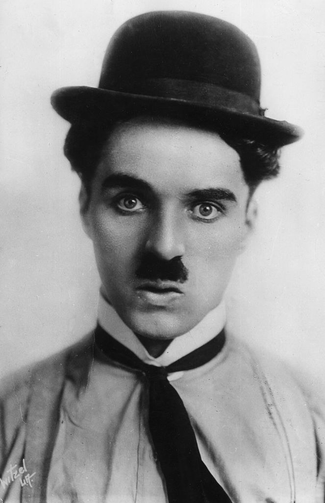 Charlie with a bowler hat and thin mustache