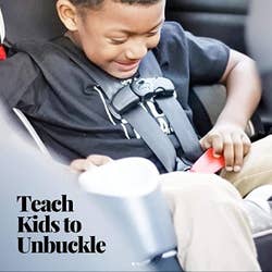 A child model using the red tool to unbuckle themself 