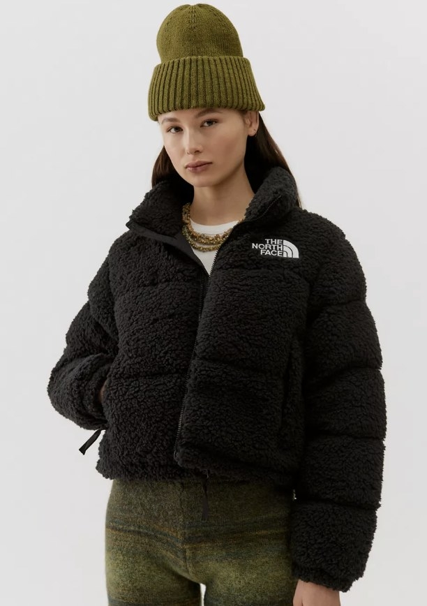 A black North Face sherpa puffer jacket