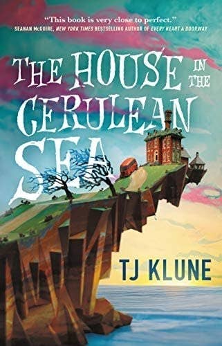 cover for the book, which is a tall cliff that gets skinnier the higher and closer to the water that it gets. atop the cliff sits a large house.