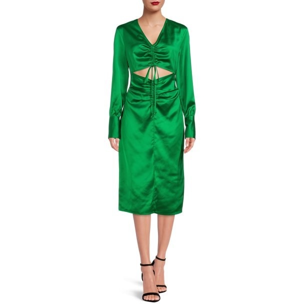 Model wearing green satin long sleeve midi dress with ruching and center cut out