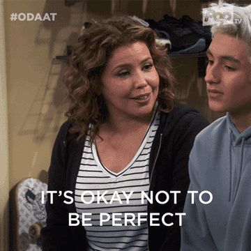 Woman saying &quot;It&#x27;s OK not to be perfect&quot;