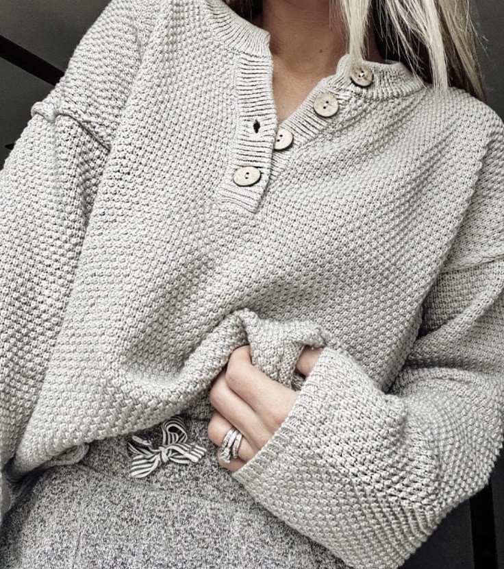 A grey oversized sweater