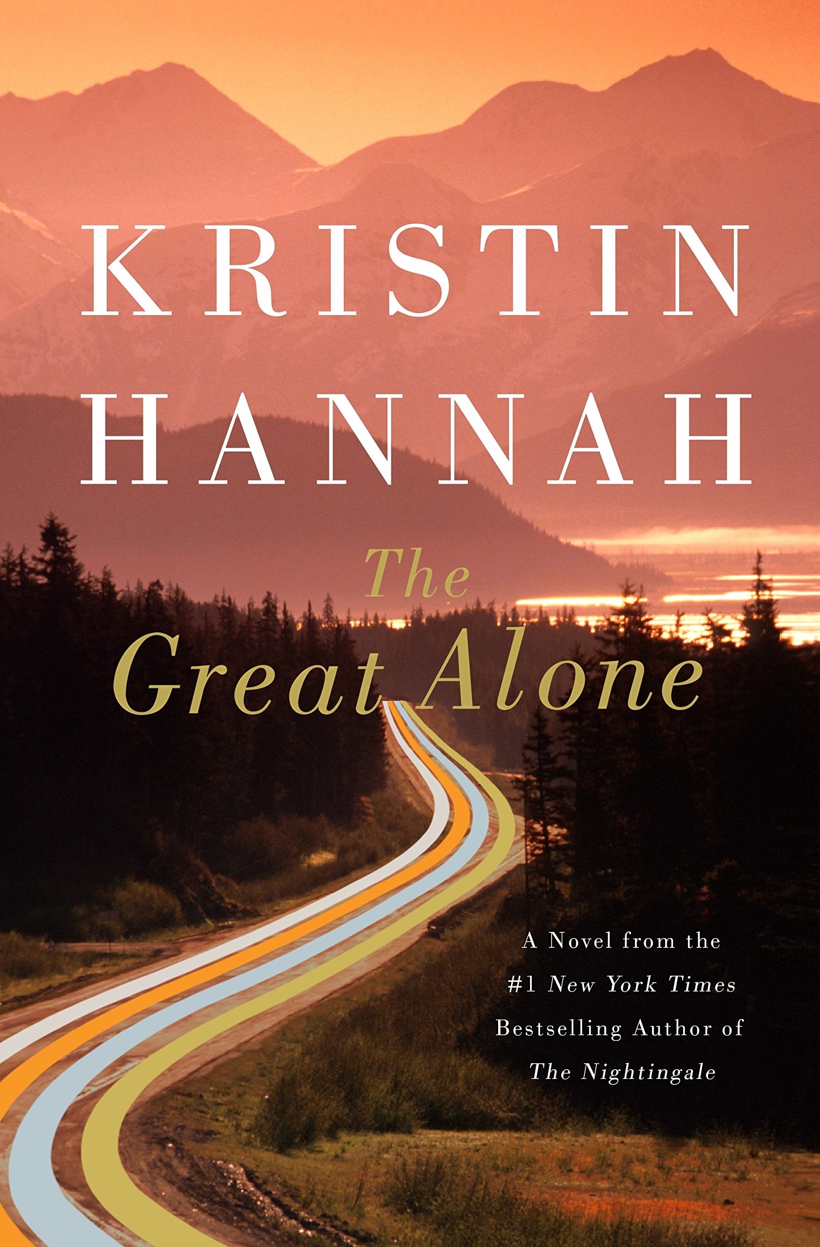 cover for &quot;The Great Alone&quot; which is a forest with a long, winding road through it.