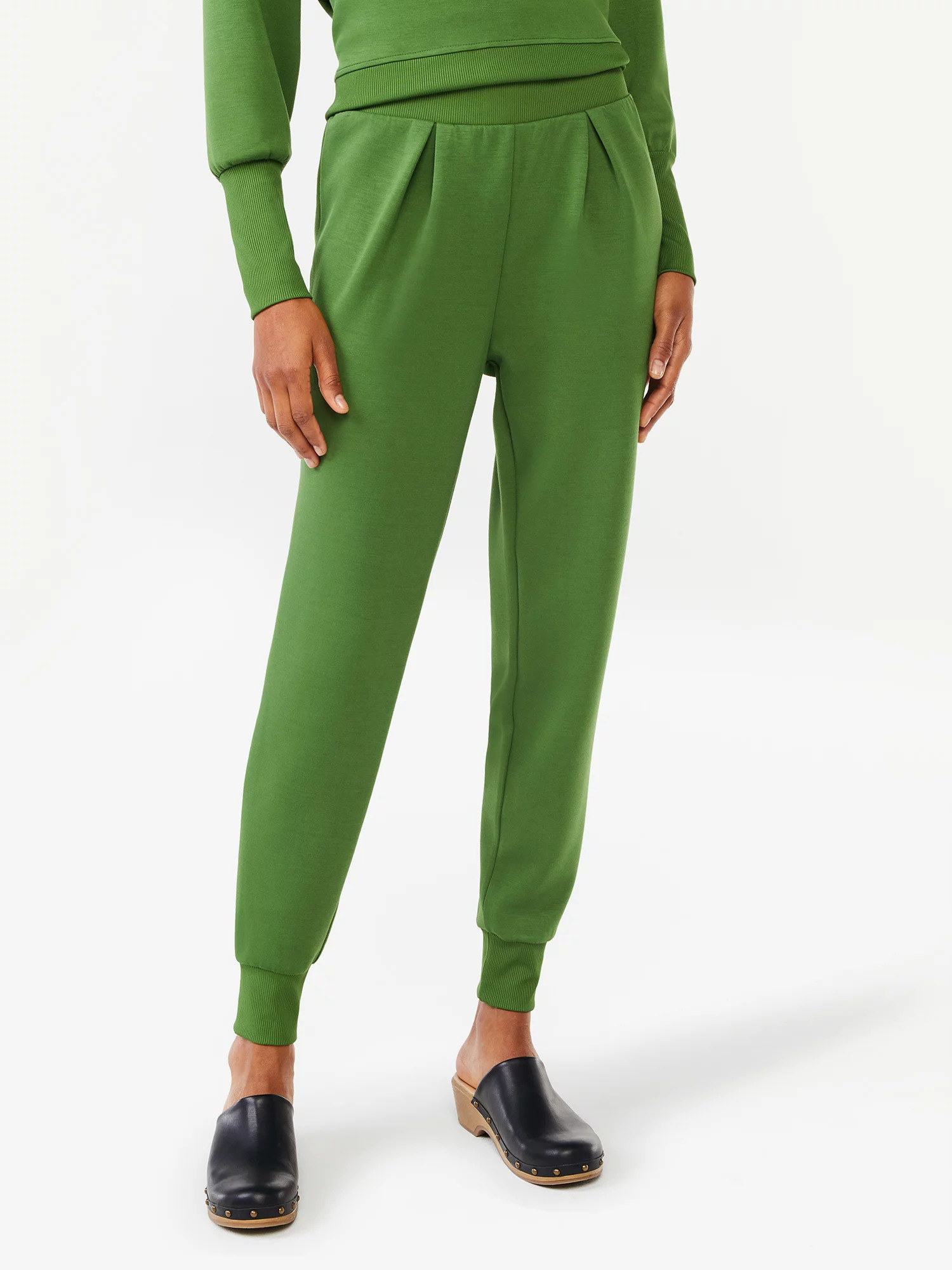 Model wearing the banana palm green pants