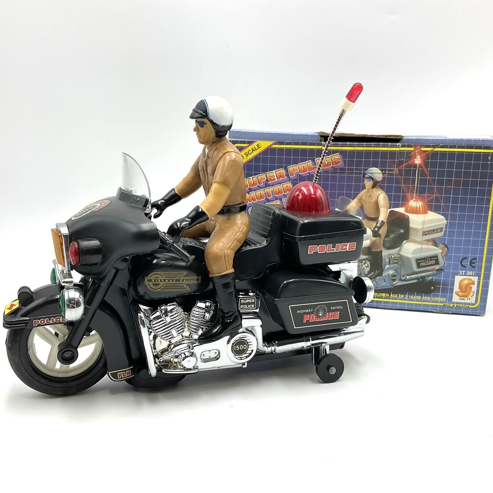 highway patrol man on motorcycle toy