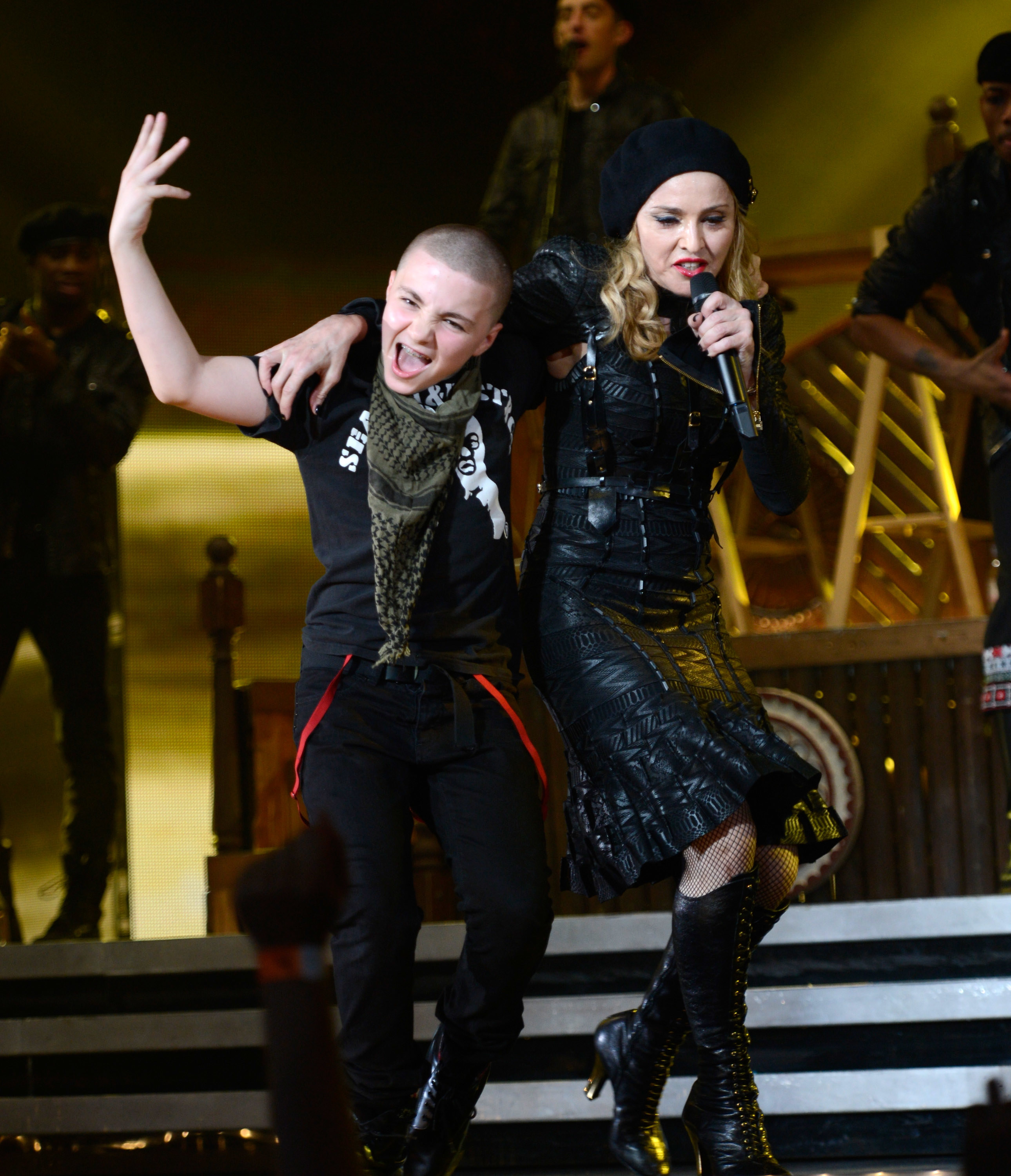 Rocco Ritchie and Madonna perform during the MDNA North America tour opener at the Wells Fargo Center on August 28, 2012 in Philadelphia, Pennsylvania