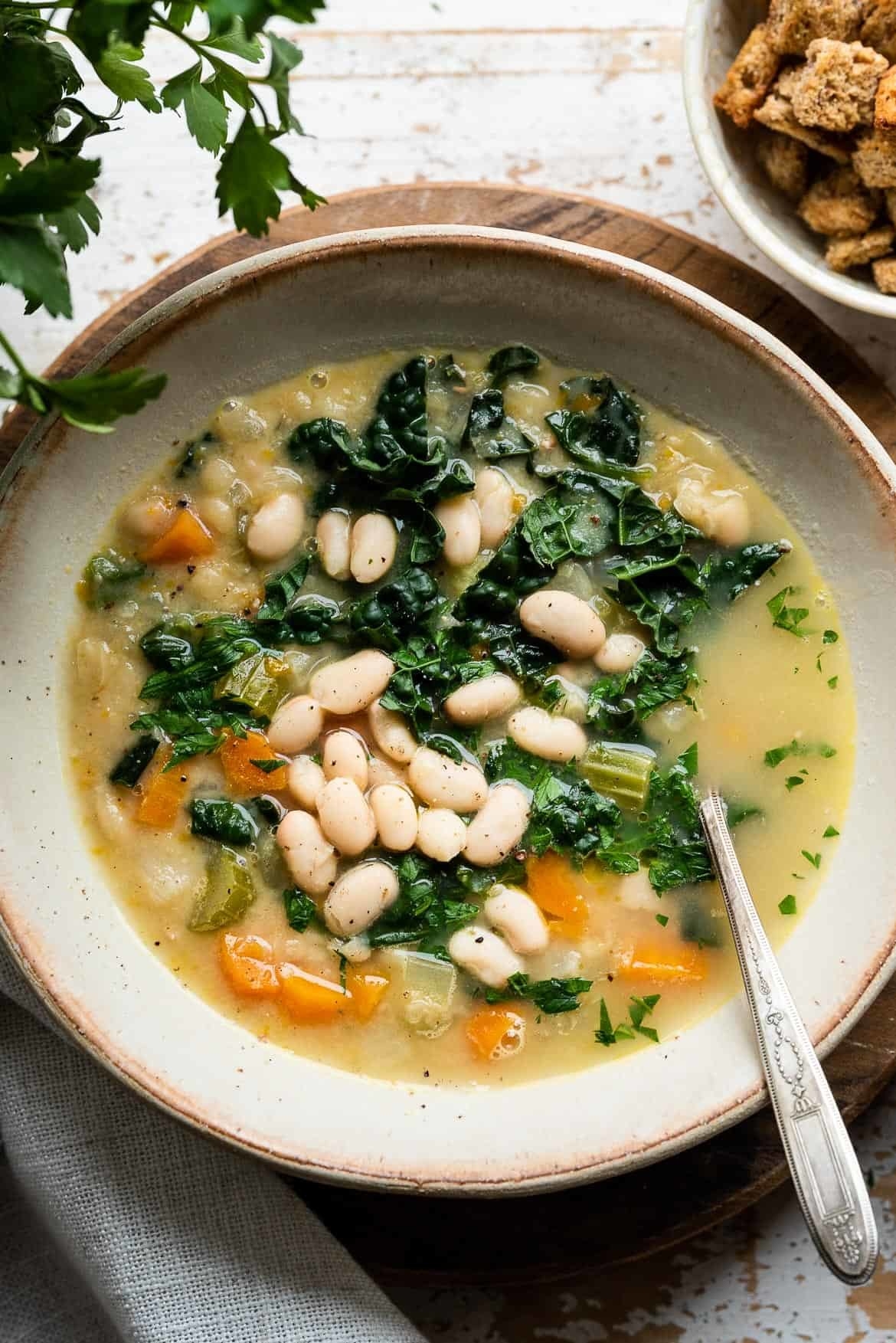 A bowl of White Bean Soup With Kale