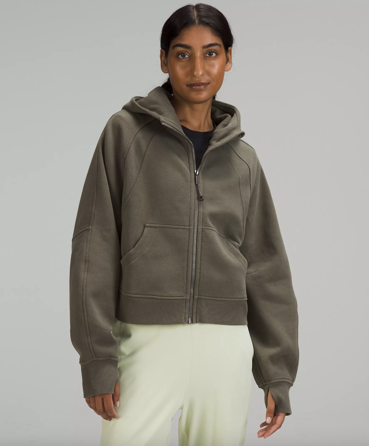 a person wearing the oversized fleece hoodie