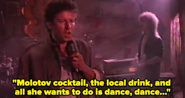 A man singing &quot;Molotov cocktail, the local drink, and all she wants to do is dance&quot;