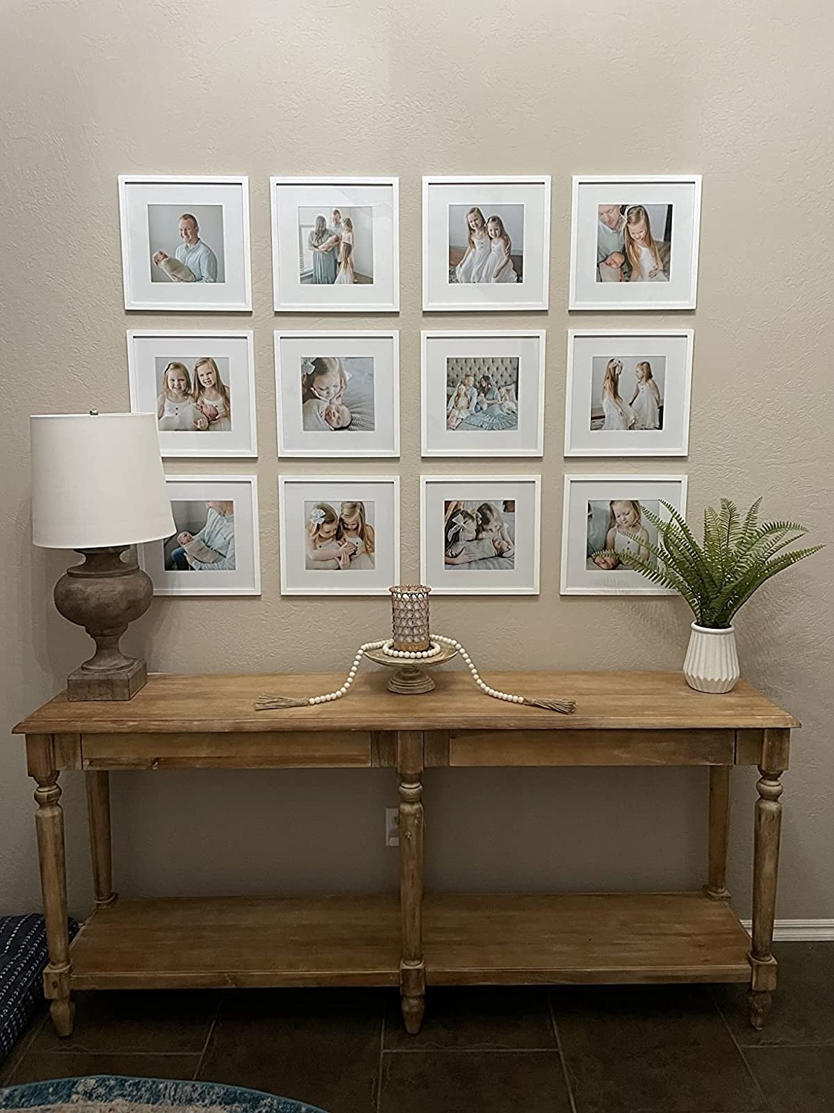 Reviewer image of frames above a console table