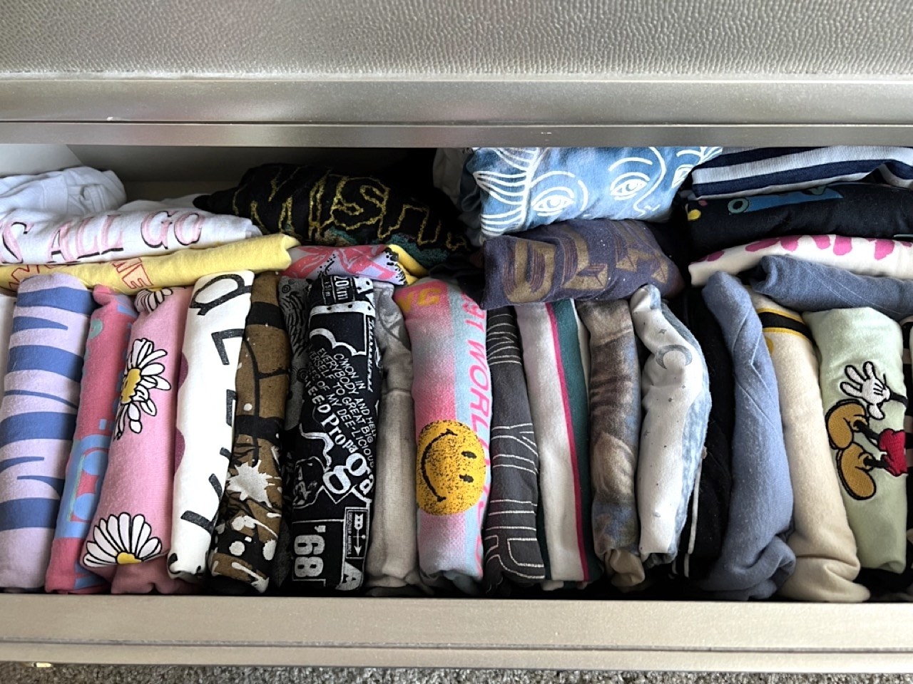 drawer full of T-shirts