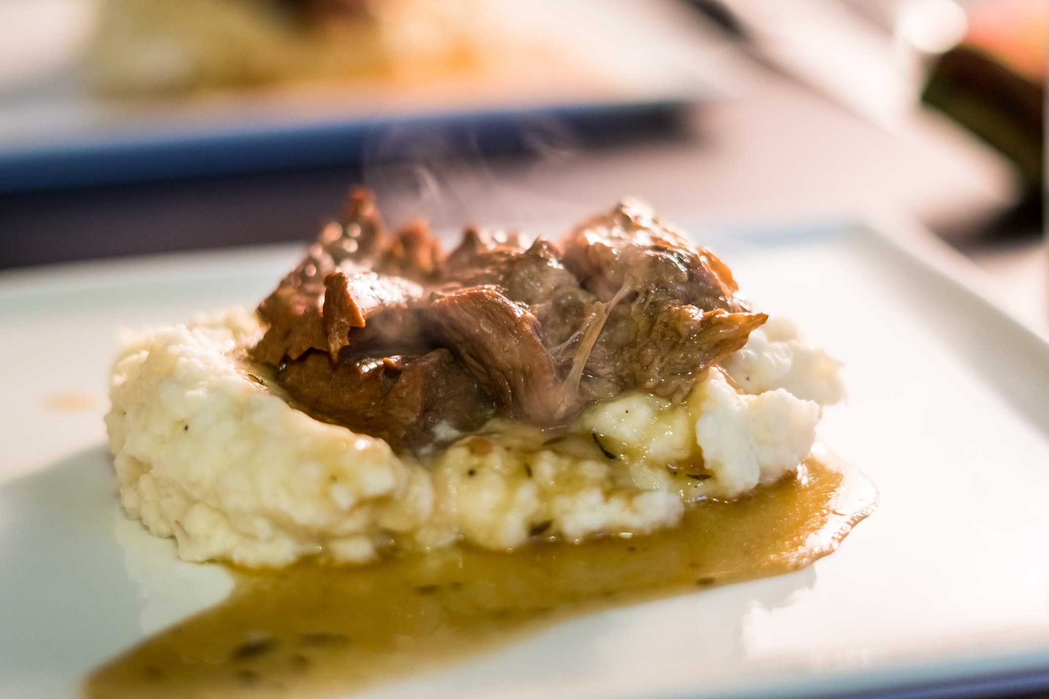 Pot roast with mashed potatoes on a plate