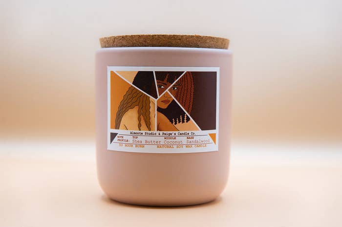 A candle with a beautiful label is shown