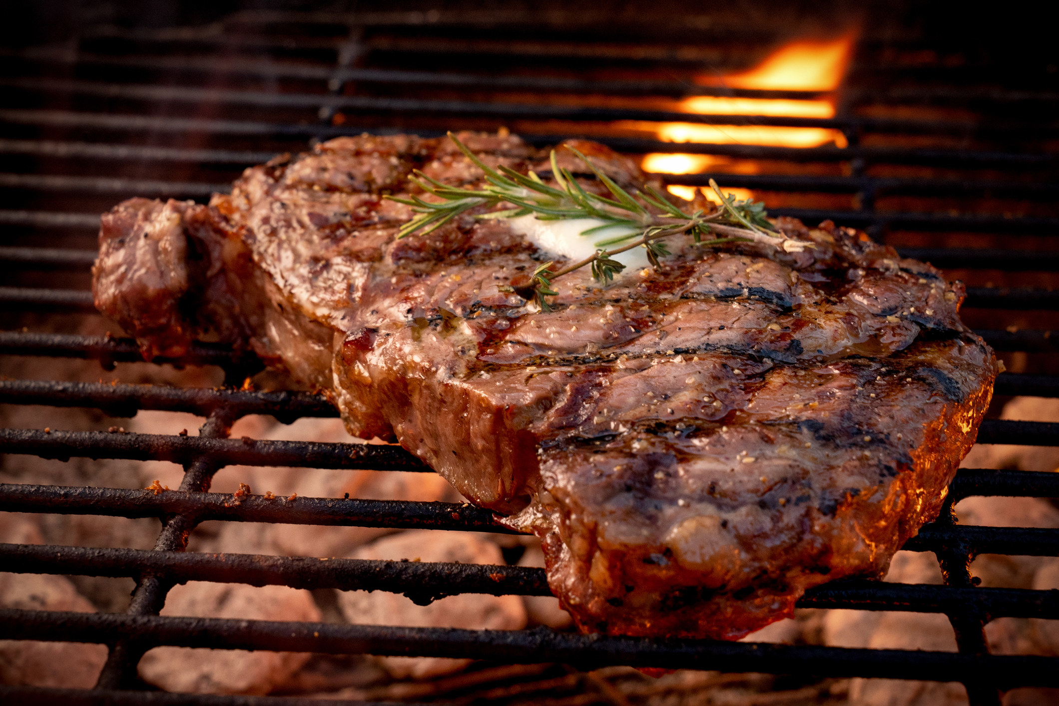 Rib eye steak on a grill