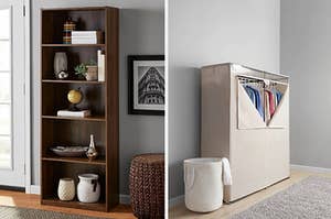 on left, dark brown bookshelf with mini globe and plants. on right, white standing clothes organizer with hanging shirts inside 
