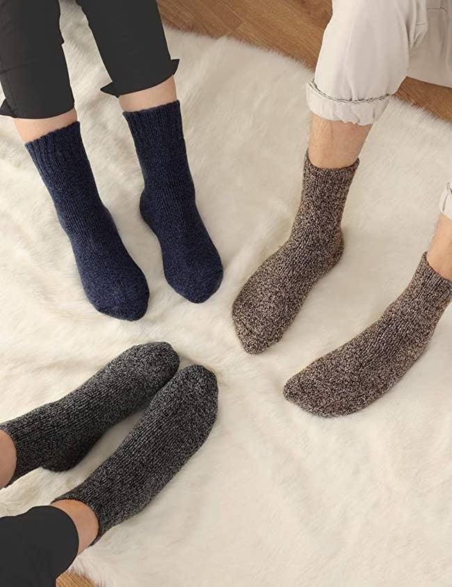 three models wearing the socks in different colors
