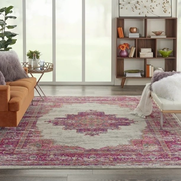 The rug in ivory and fuchsia