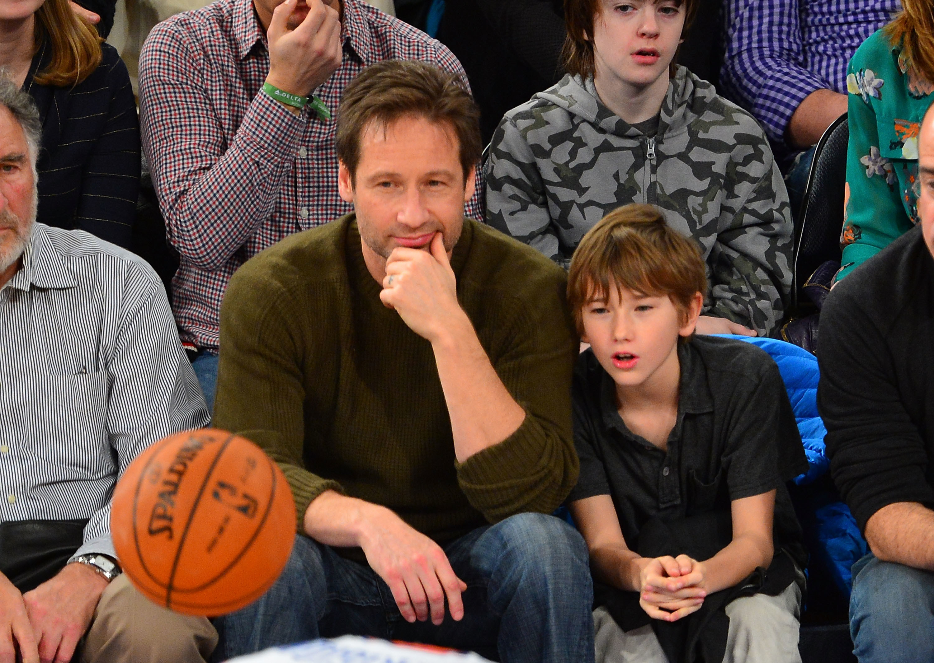 David Duchovny and Kyd Miller Duchovny attend the Denver Nuggets vs New York Knicks game at Madison Square Garden on December 9, 2012 in New York City