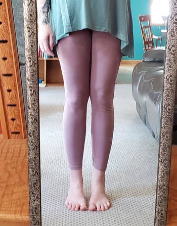 Reviewer's photograph of them wearing the leggings successful the colour Mauve