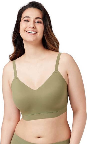 A model wearing the bra in green