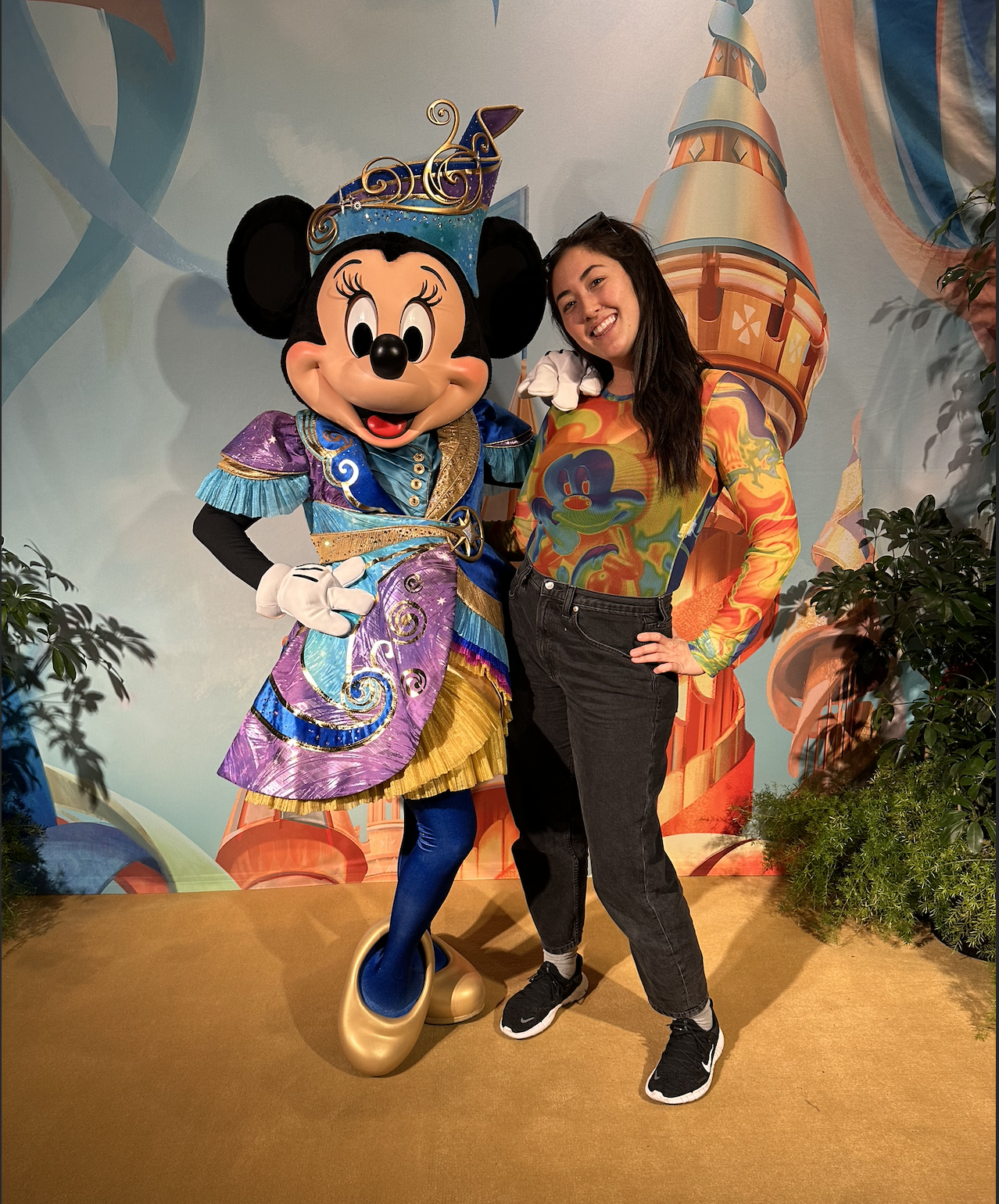 The writer posing with Minnie Mouse
