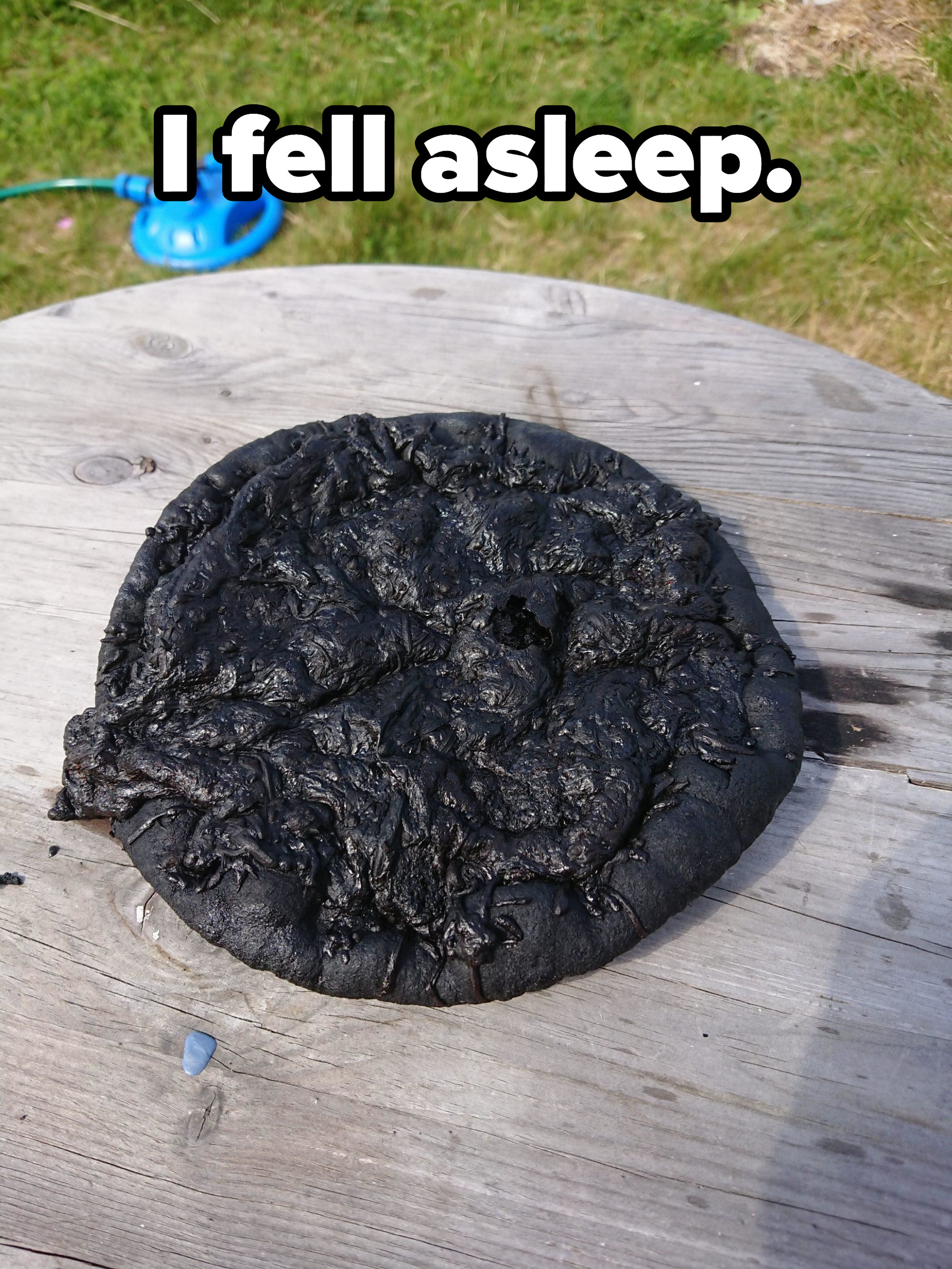 Pizza cooked to a black crisp