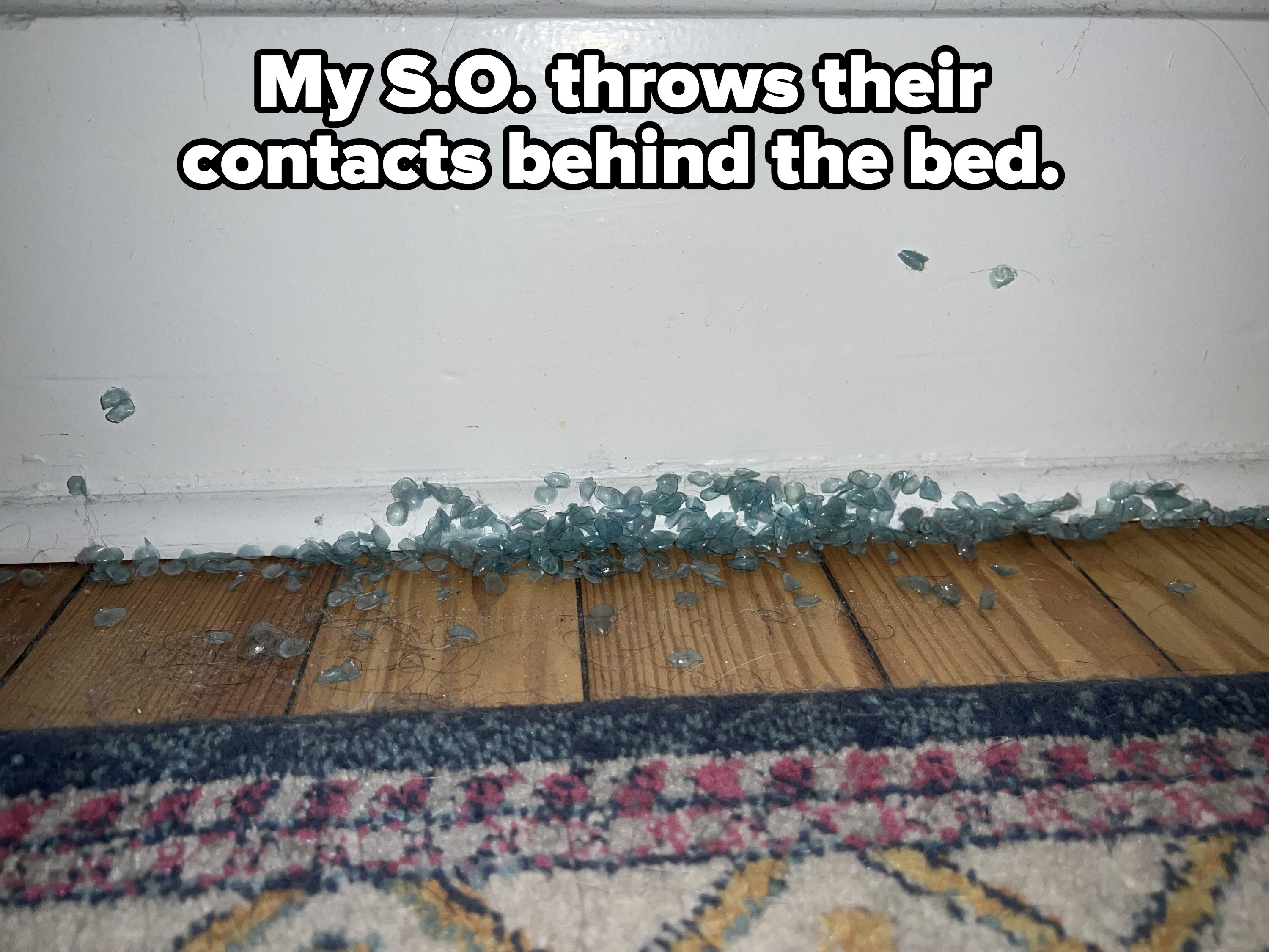 A pile of contact lenses deposited behind a bed