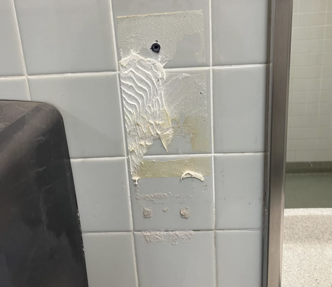 A soap dispenser removed