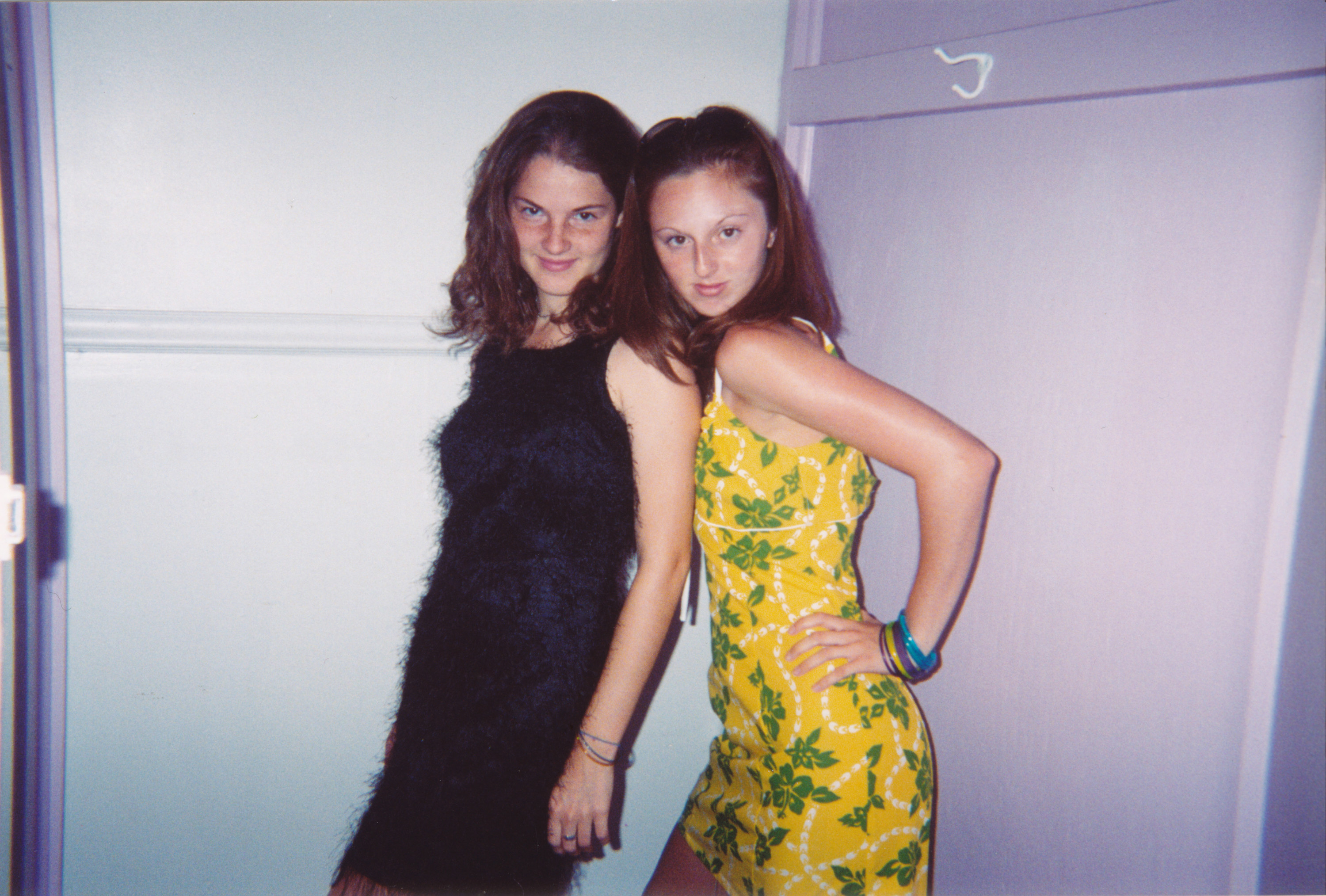 two friends in the &#x27;90s posing for a photo