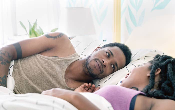 Jessica and LaKeith Stanfield in bed