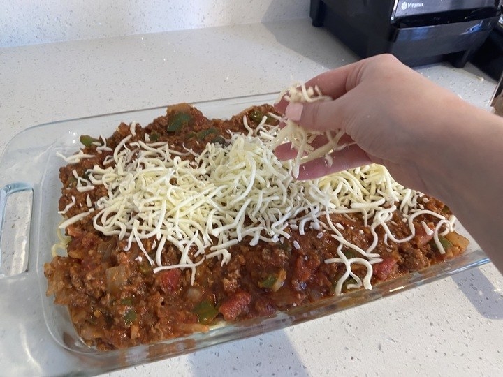 cheese being added on top