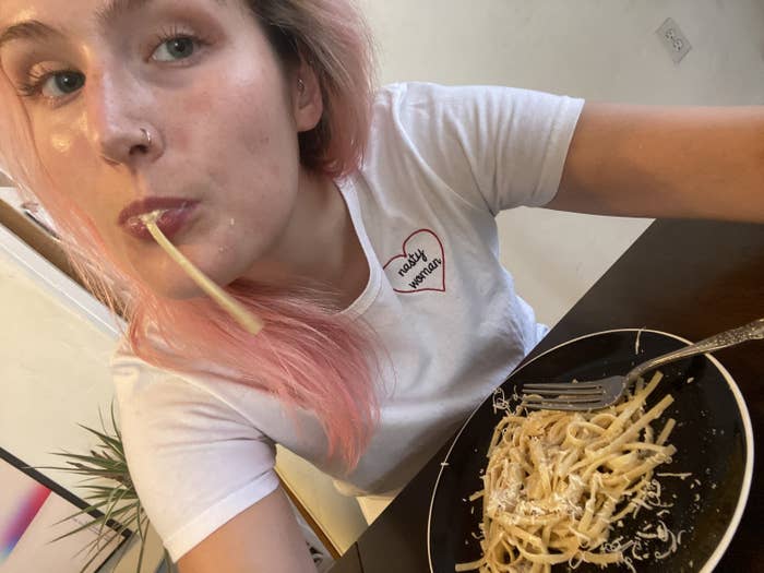 author eating pasta